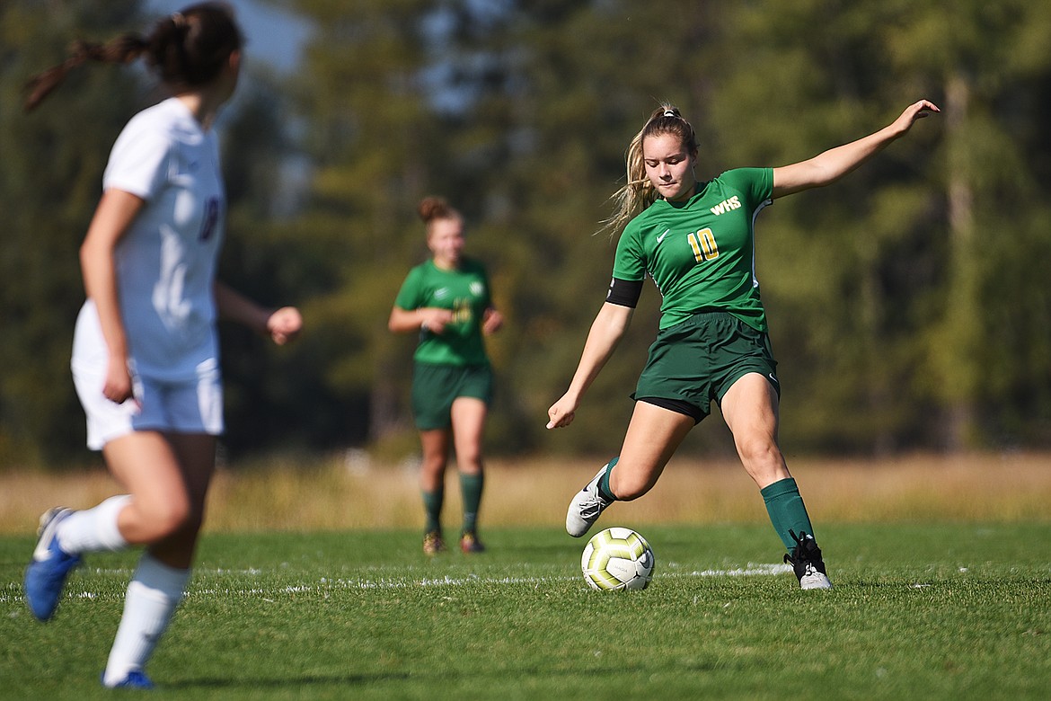 Whitefish’s Ali Hirsch (10) looks to pass upfield against Columbia Falls at Smith Fields in Whitefish on Saturday. (Casey Kreider/Daily Inter Lake)