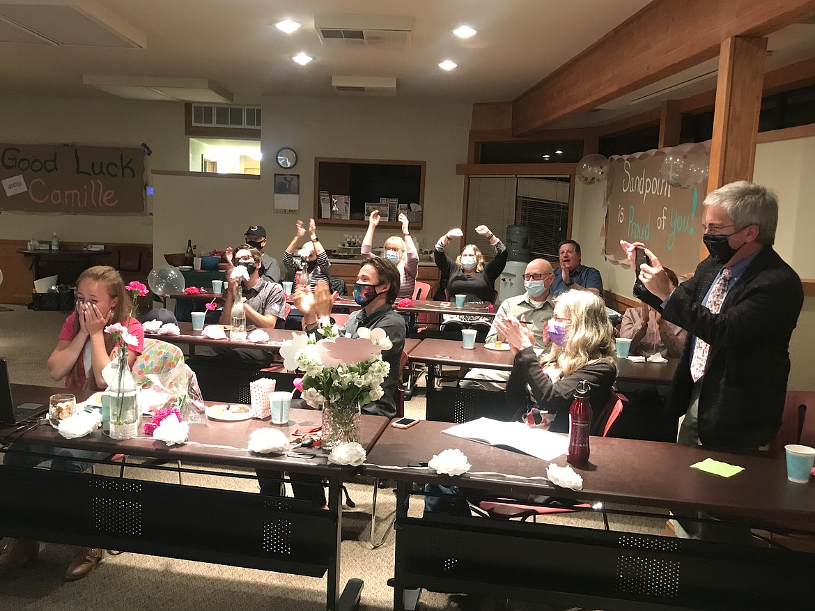 Camille Neuder, left, reacts in surprise as friends and family watch and cheer after she was named Idaho's Distinguished Young Woman for 2021 on Saturday.