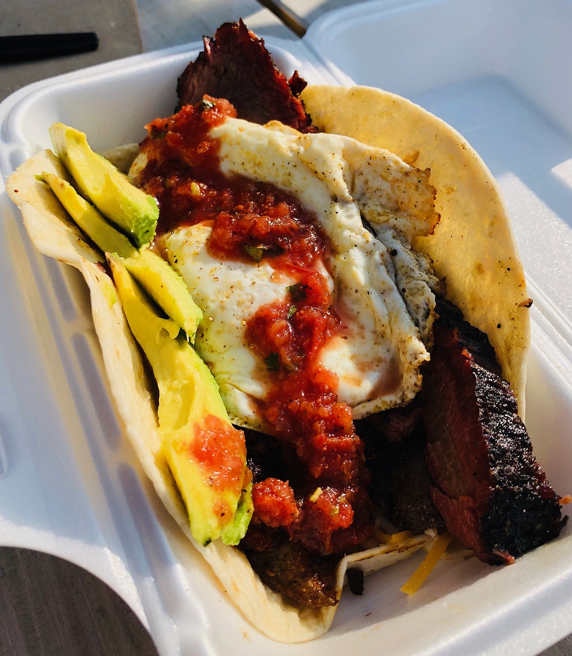 The Lawless Breakfast Taco… An 8-inch flour tortilla filled with chorizo, smoked potatoes, homemade salsa, avocado and smoked brisket. It's OK if you're drooling, I did too.