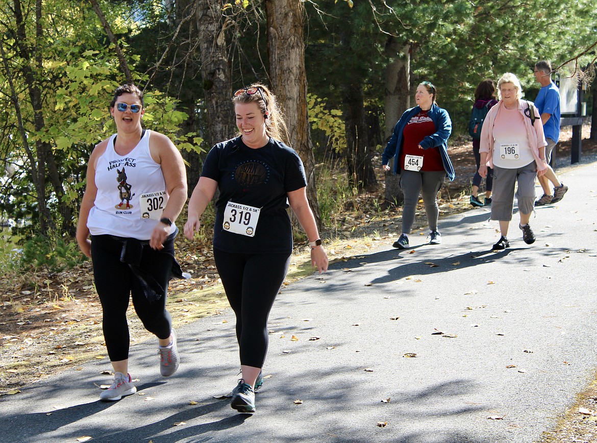 Participants Tara Lodi, Elizabeth Malsom, Elizabeth Whalen and Karen Enich make their way down the Trail of the Coeur d'Alenes near Elizabeth Park.
