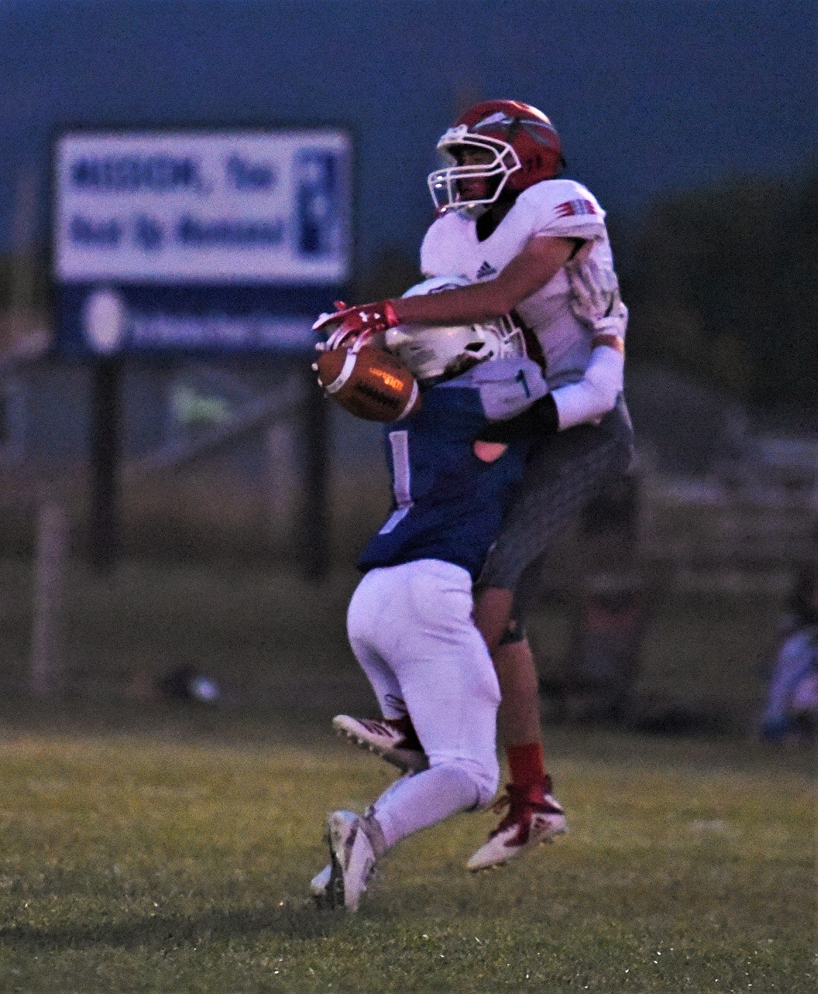 Mission sophomore Bryce Umphrey breaks up a pass intended for Warriors freshman Kendall O'Neill. (Scot Heisel/Lake County Leader)