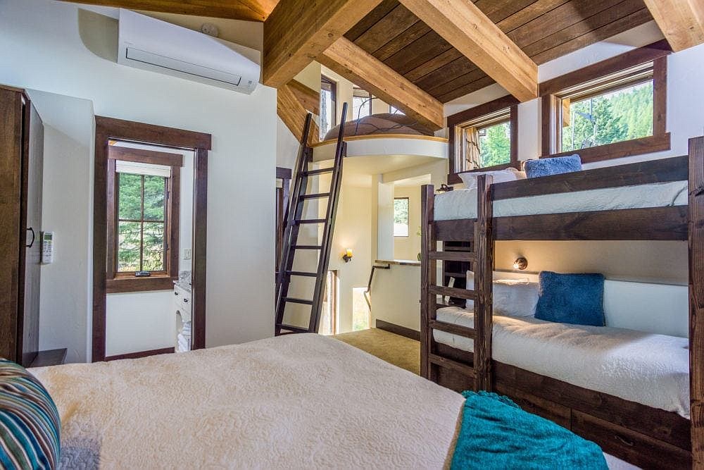 The interior view of one of the Snow Bear Chalets, including a glimpse up into the turret (Photo credit: Trevon Baker Photography).