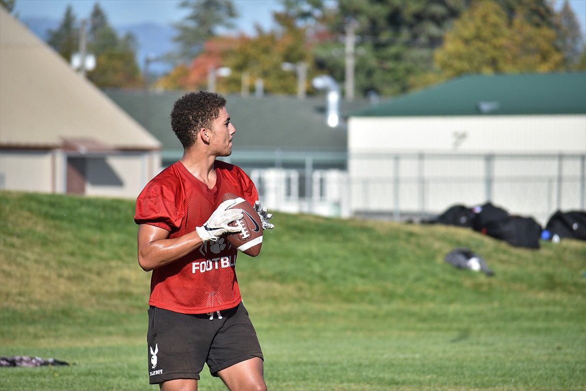 Elijah Larson prepares to throw a pass on Wednesday.