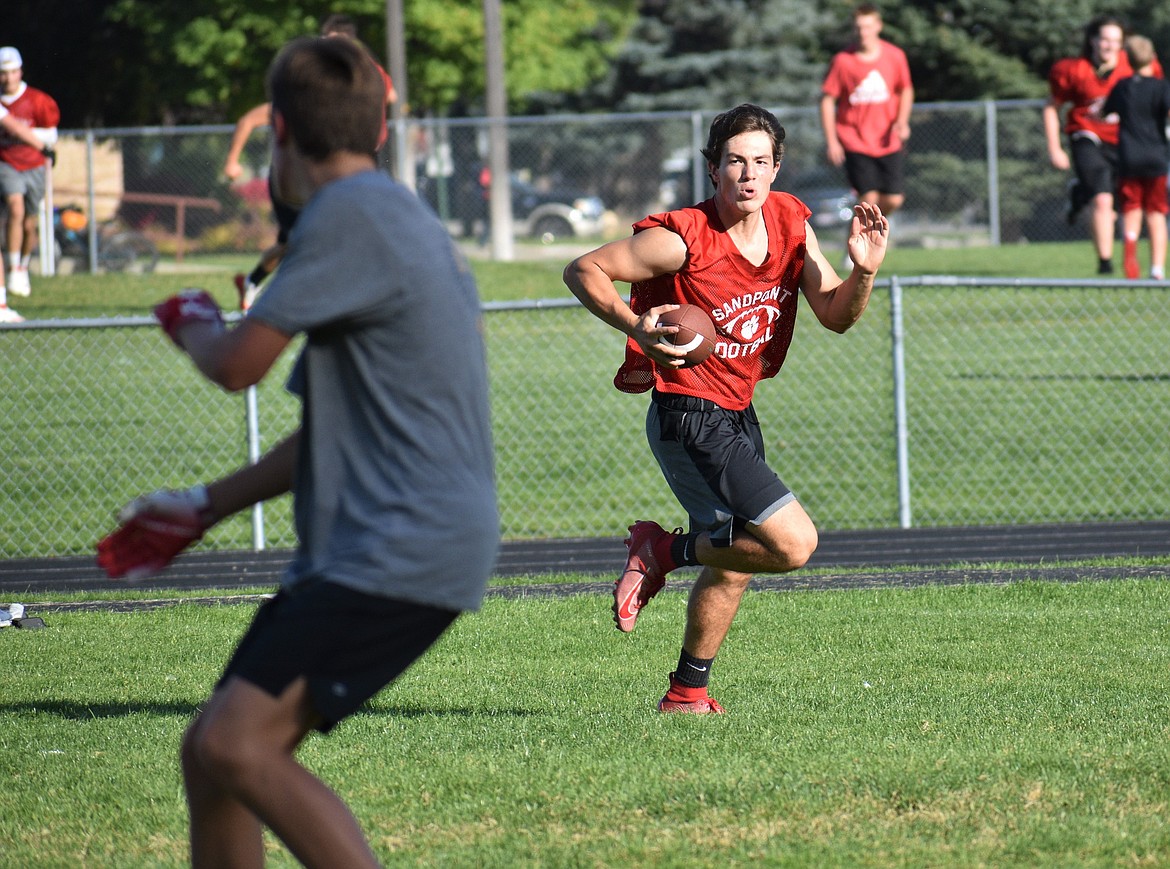 Auggie Lehman scrambles and looks for an open receiver on Wednesday.