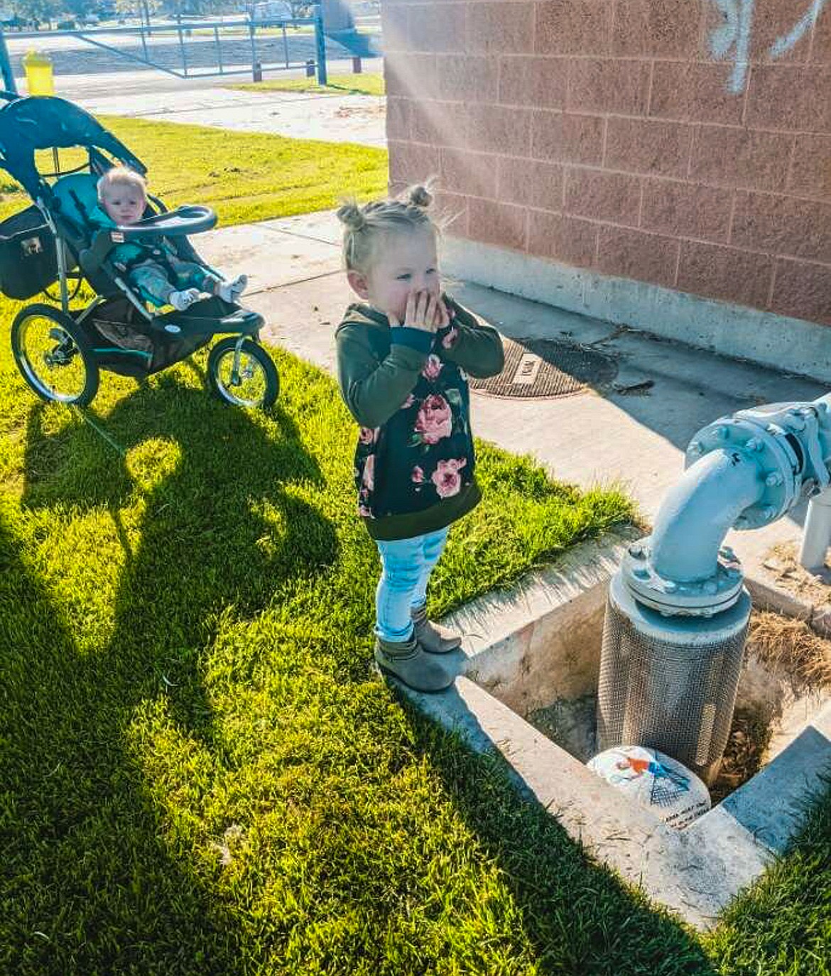 Natalie Lundsten, 2, is filled with excitement finding a rock for the Park Bingo Scavenger Hunt event started by Moses Lake Parks & Recreation last week.