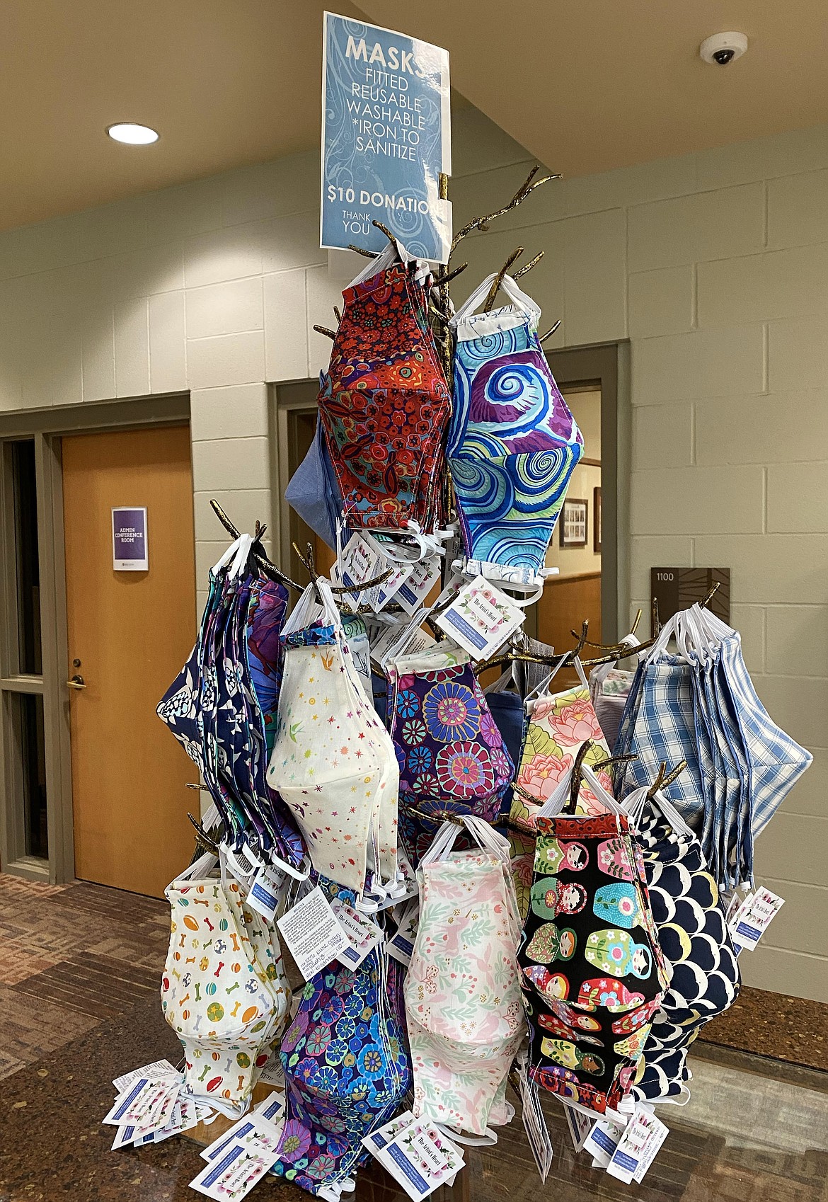 Masks lovingly made by Salvation Army Major Ronda Gilger are seen here displayed on a tree in the Kroc Center. The masks are $10 each. All proceeds support sustainable Salvation Army efforts across Moldova, where Gilger served for three years.