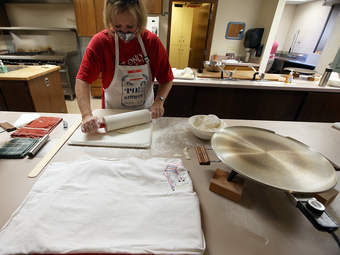 Cindy McManus rolls out dough for lefse on Wednesday.