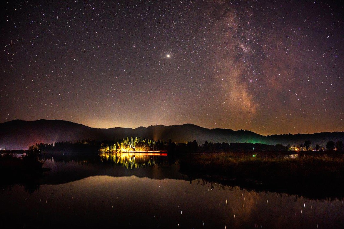 Photo by Ron Reeve
This photo was taken Tuesday nightover the Medicine Lake wetlands looking toward Highway 3
about two hours after sunset and just before moonrise. It shows Mars, which is the closest to Earth as it will be for the next 15 years.It is currently the third brightest object in the sky after the sun and moon.