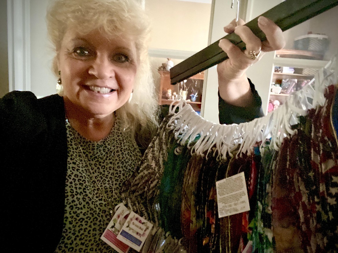 Salvation Army Major Ronda Gilger is seen here with some of the masks she has made to help her community and people in need in Moldova, where she served before being appointed to Coeur d'Alene.