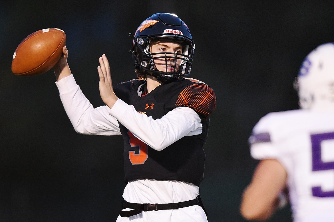 Flathead quarterback Charlie Hinchey (9) looks to throw in the first quarter against Butte at Legends Stadium on Friday. (Casey Kreider/Daily Inter Lake)