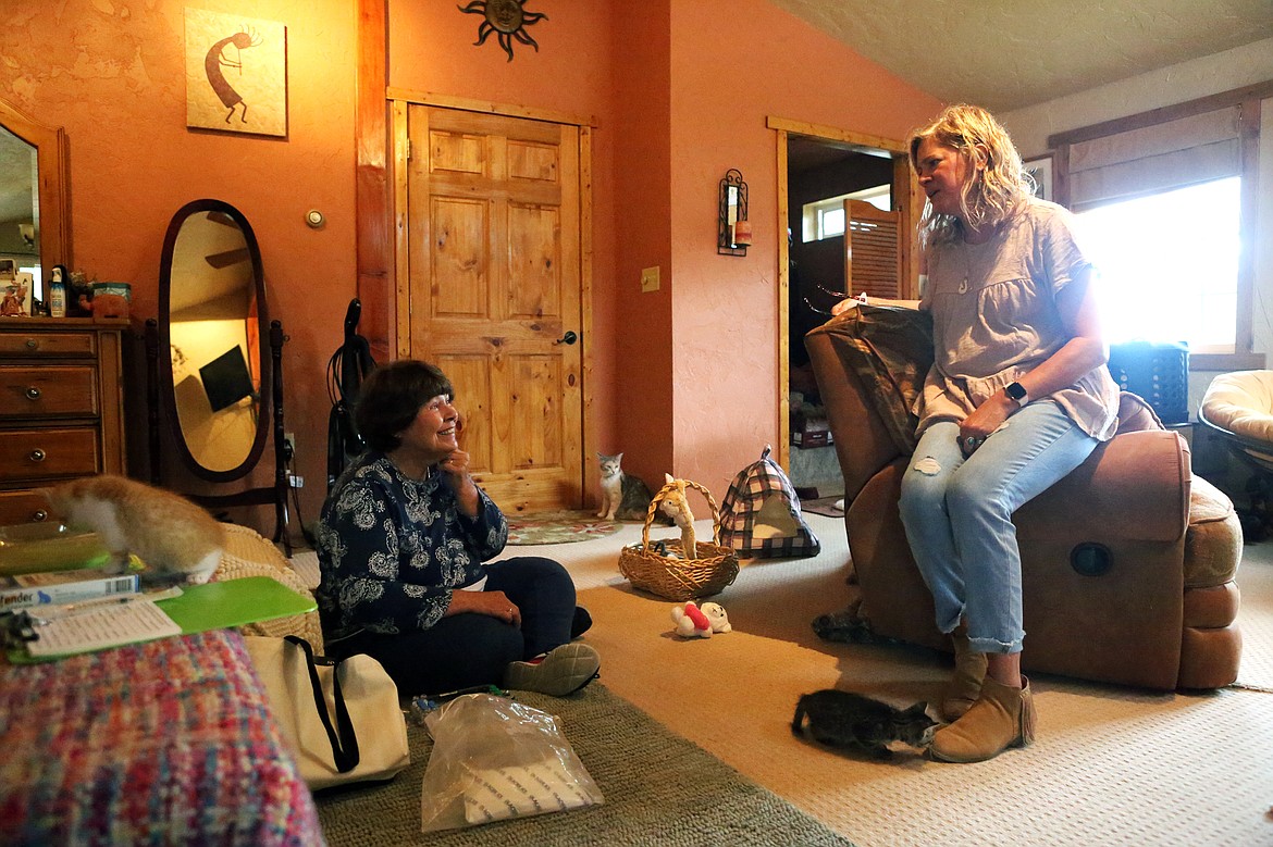 Kitty MOM's Rescue founder Darcy Albert chats with volunteer foster parent, Lisa Benvenuto before the pair vaccinate nine kittens and their mother on Sept. 24.
Mackenzie Reiss/Daily Inter Lake