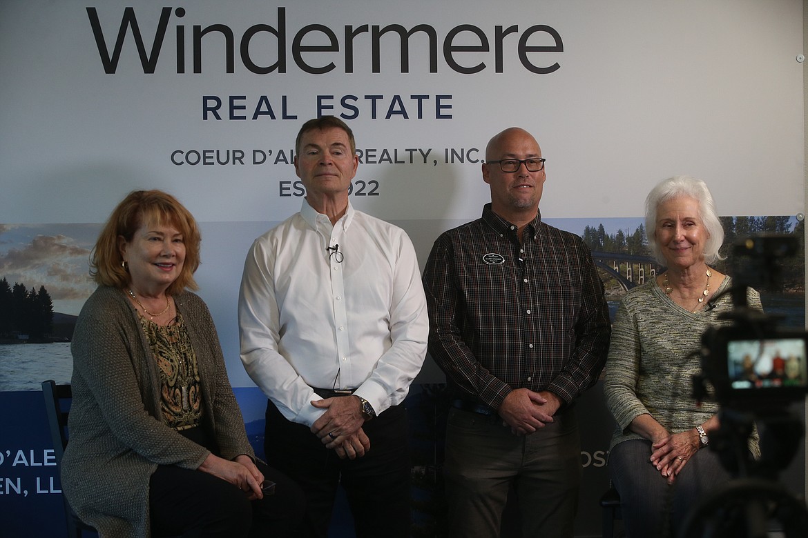 Windermere Coeur d'Alene Real State team members are filmed Friday for a short clip that will show Oct. 27 when a promotional campaign kicks off for the Salvation Army's virtual Red Kettle Campaign. From left, Pat Krug, designated broker Idaho and Washington, co-owner; Don "Pepper" Smock, owner, Larry Frisbie and Joan Genter, real estate agents.