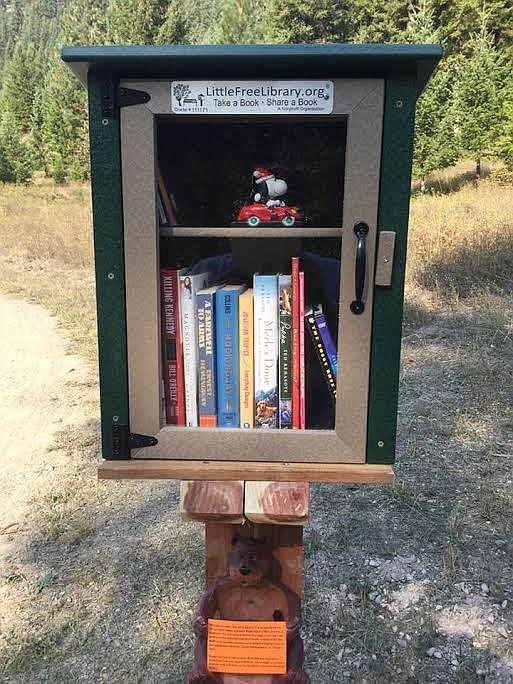 When driving up Deep Creek look for the Arnsan's Marine Corps flag and a U.S. flag that help mark the location of their Little Free Library. When you go to the Little Free Library website you can shop for your very own library box, or even gets plans to build one yourself. The Arnsans went with a library box made out of a composite material that is eco-friendly and uses plastic lumber made out of recycled milk jugs. This box easy to take care of and will withstand all of Montana's harsh seasons. (Photo by Dan Arnsan)