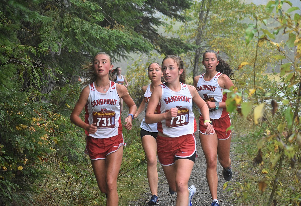 A pack of Sandpoint girls run together during Saturday's William Johnson Sandpoint Invitational.