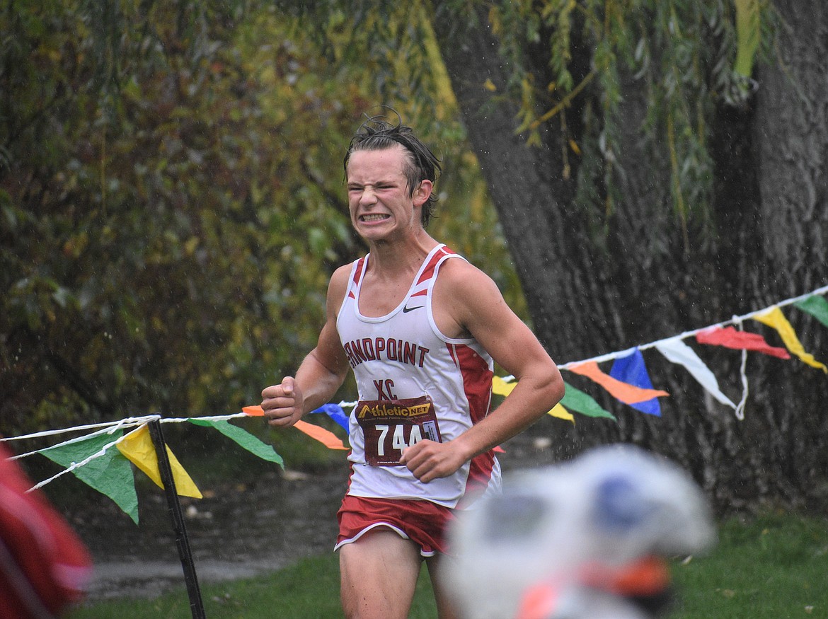 Sophomore Slate Fragoso grinds it out as he nears the finish line during Saturday's William Johnson Sandpoint Invitational.