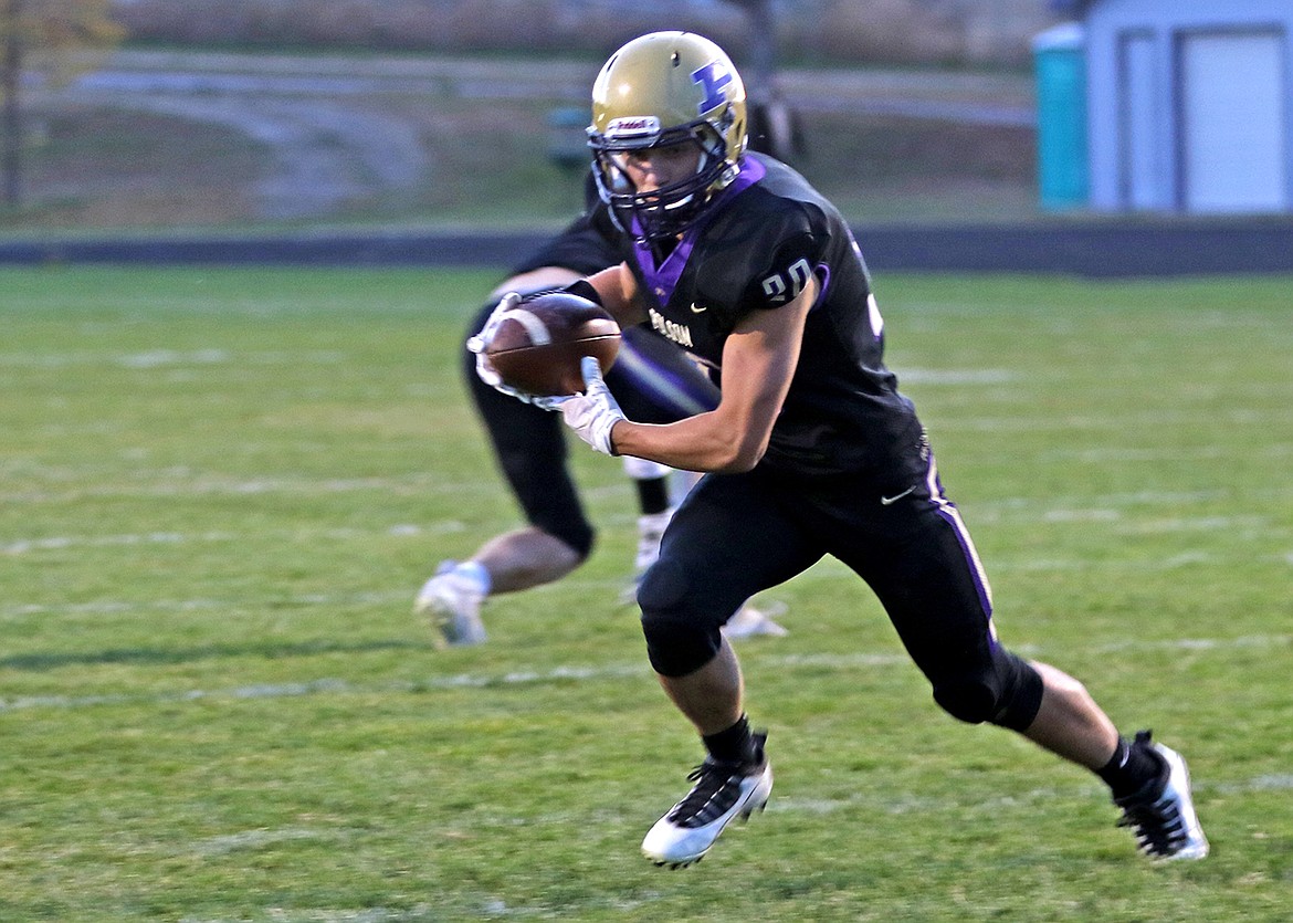 Xaier Fisher scores the Pirates' first touchdown against Bigfork. (Bob Gunderson)