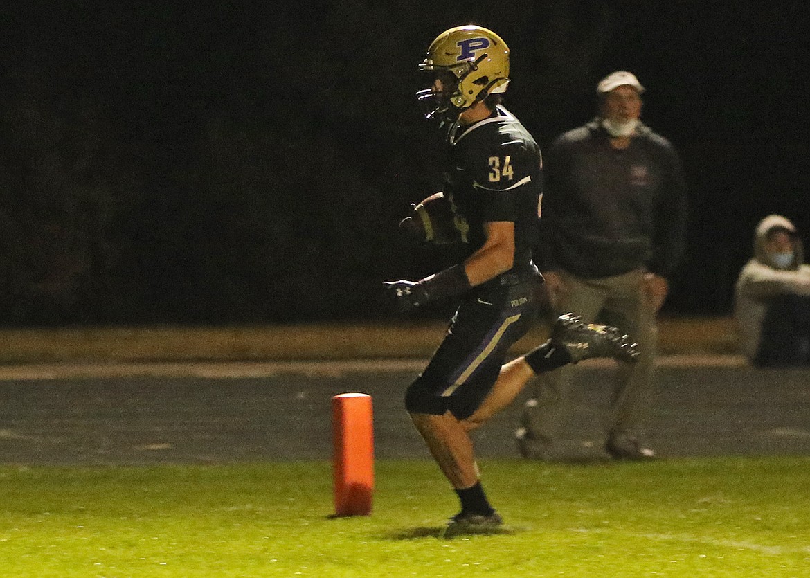 Boston Goode coasts into the end zone for a score against Bigfork. (Bob Gunderson)