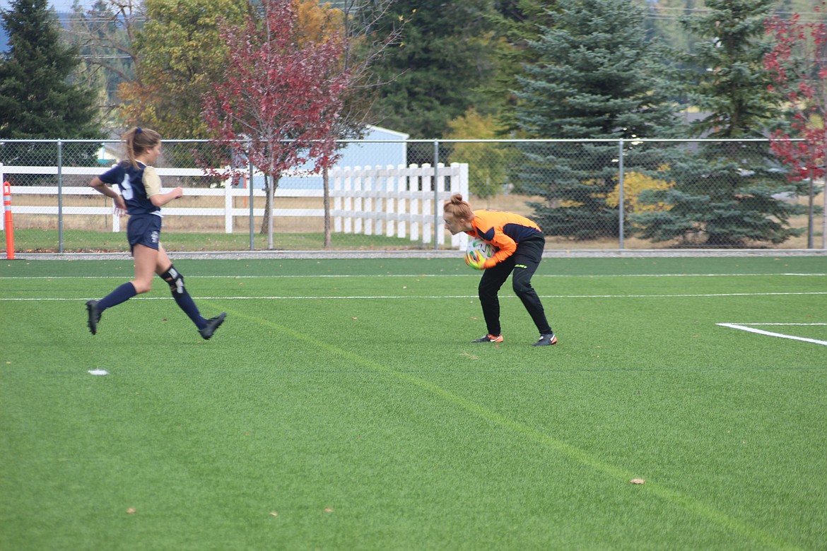 JOEL DONOFRIO/Press
Priest River senior goalkeeper Makia Fitzmorris beats Timberlake's Alexis Barry to the ball in the first half of Monday's game. Fitzmorris kept the Tigers off the scoreboards with several acrobatic saves in the game's first 40 minutes.