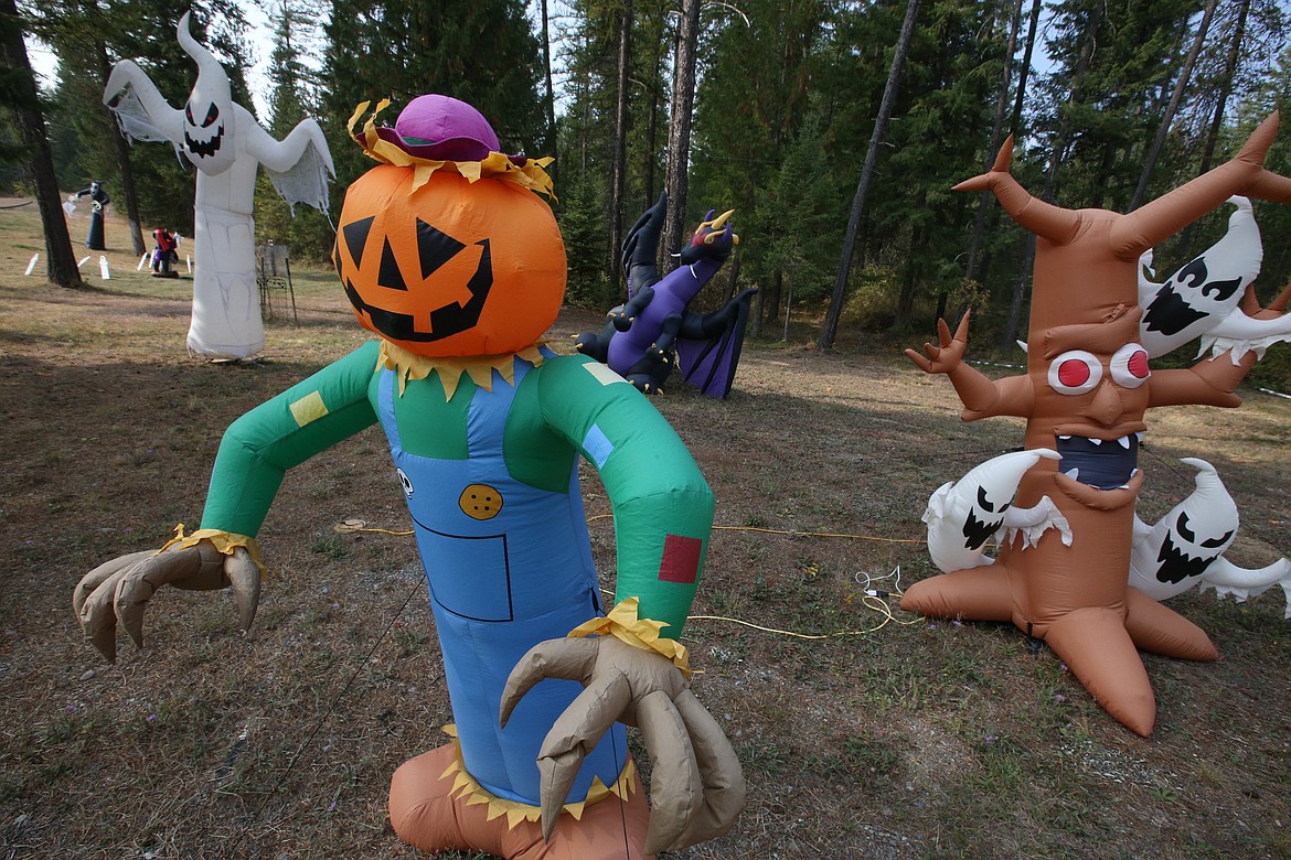 Halloween decorations stand tall at the Spirit Lake home of Mike and Debbie Bendig.