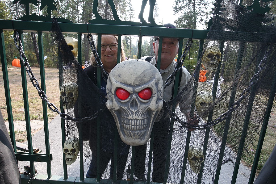 Mike and Debbie Bendig welcome visitors to check out their Halloween displays.