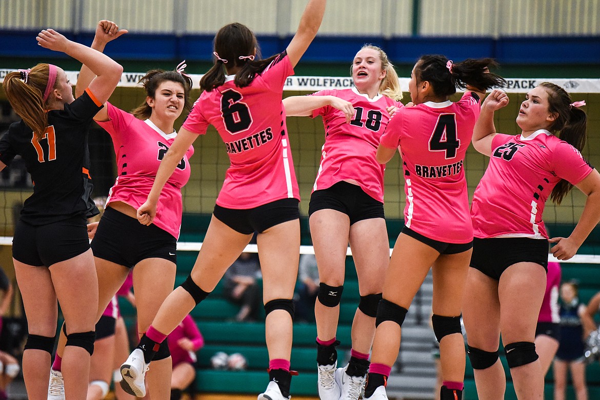 Flathead celebrates a point against Glacier in crosstown volleyball at Glacier High School on Tuesday. (Casey Kreider/Daily Inter Lake)