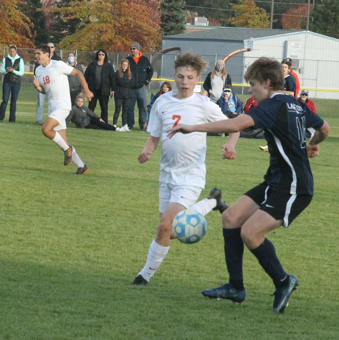 JASON ELLIOTT/Press
Post Falls sophomore midfielder Andon Brandt attempts to deflect the ball away from Lake City sophomore forward Bryce Allred during the second half of Wednesday's match at the Irma Anderl Soccer Complex.