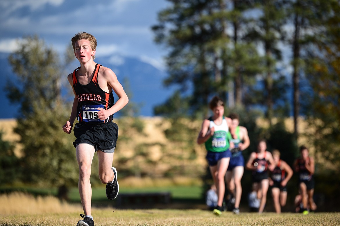 Flathead's Aden Kleinhenz leads a group up a hill during the Glacier Invite at Rebecca Farm on Wednesday. (Casey Kreider/Daily Inter Lake)