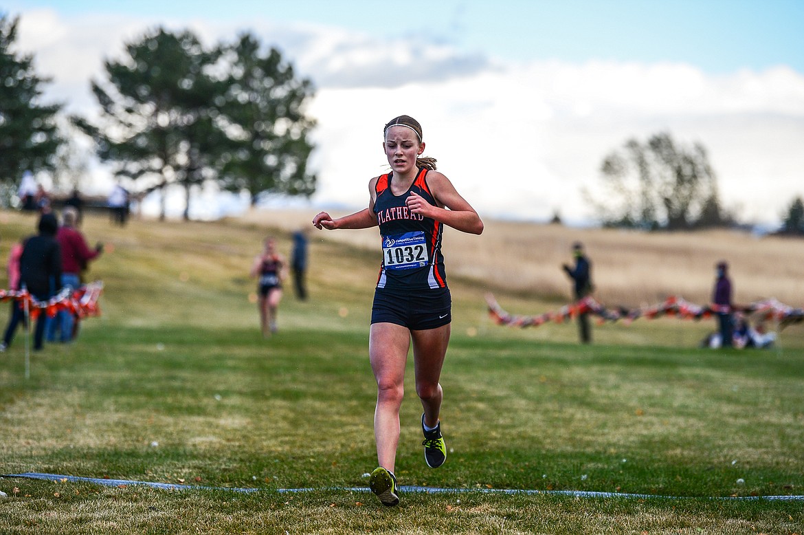 Flathead's Lilli Rumsey Eash crosses the finish line in first place in the girls' race at the Glacier Invite at Rebecca Farm on Wednesday. (Casey Kreider/Daily Inter Lake)