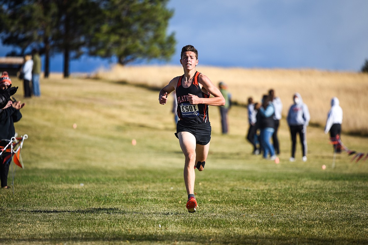 Flathead's Gabriel Felton heads to the finish line in second place during the boys' race in the Glacier Invite at Rebecca Farm on Wednesday. (Casey Kreider/Daily Inter Lake)