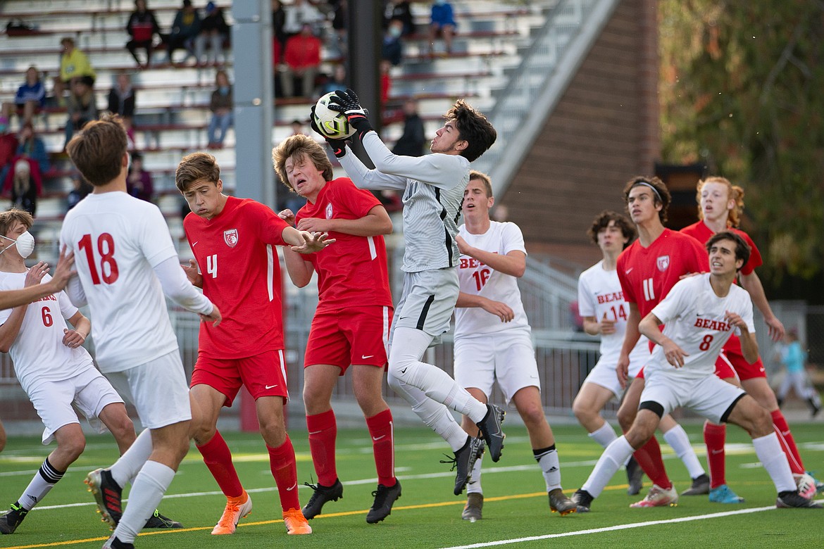 Sophomore goalkeeper Roman Jiles makes a save in traffic on Thursday.