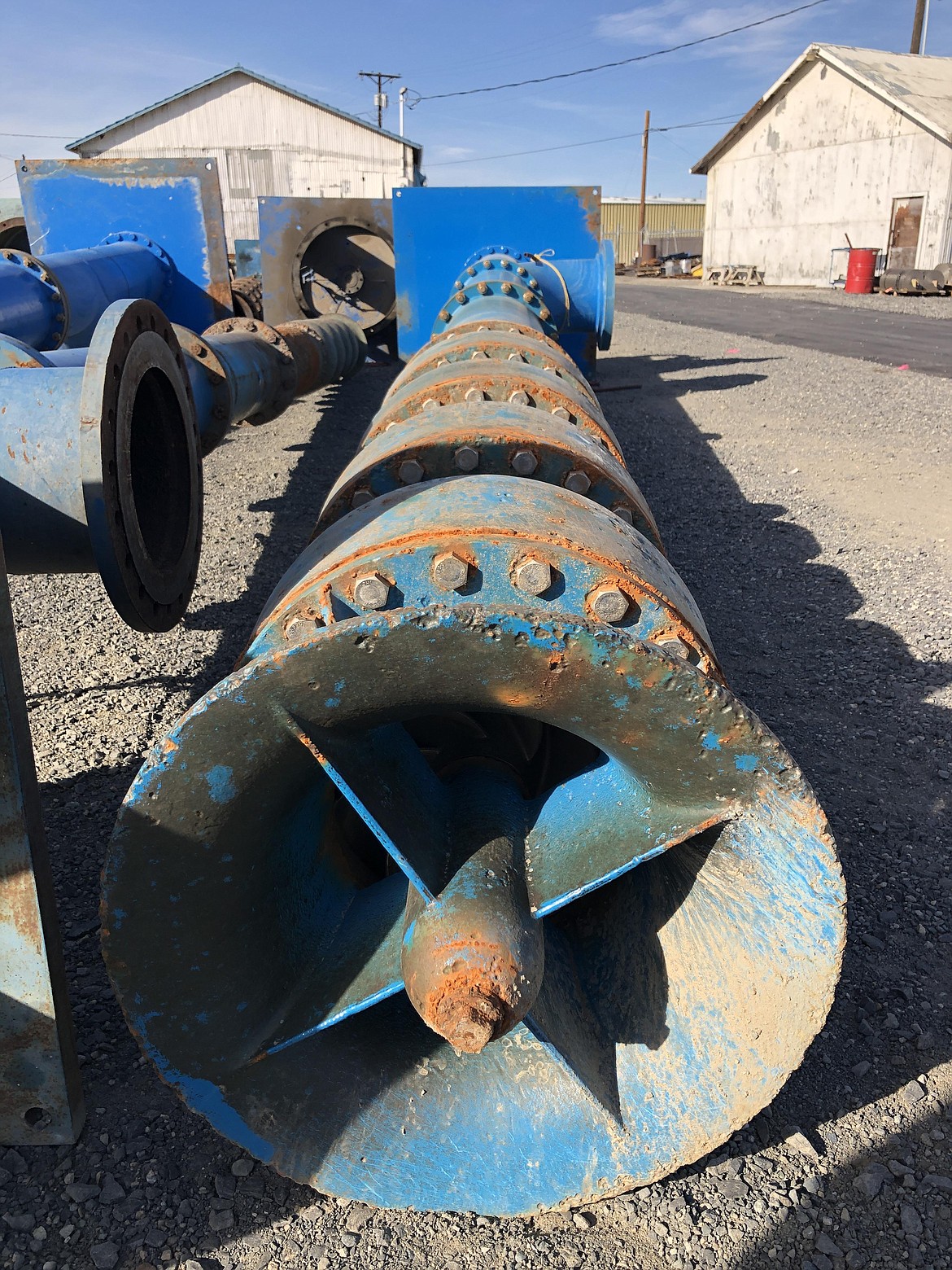 A long pump shaft used to draw water from the Columbia River for irrigation awaiting repair work at Pasco Machine's pump shop.