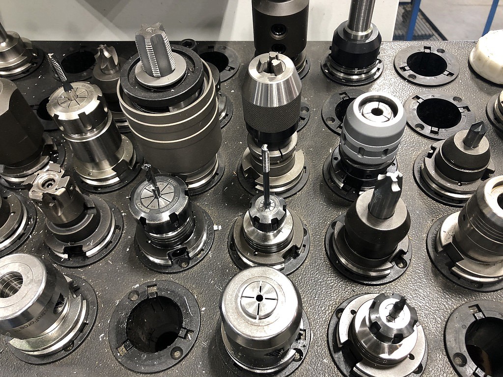 Tool heads for a computer numerical control (CNC) machine.