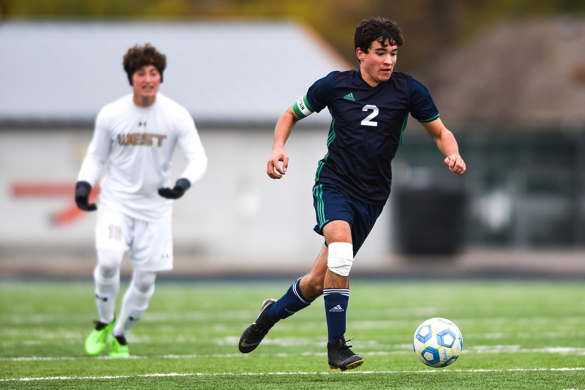 Glacier's Diego Mendoza (2) pushes the ball upfield in the first half against Billings West at Legends Stadium on Saturday. (Casey Kreider/Daily Inter Lake)