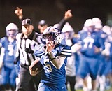 Cats lose to Broncs, 28-21 in the wind and the rain