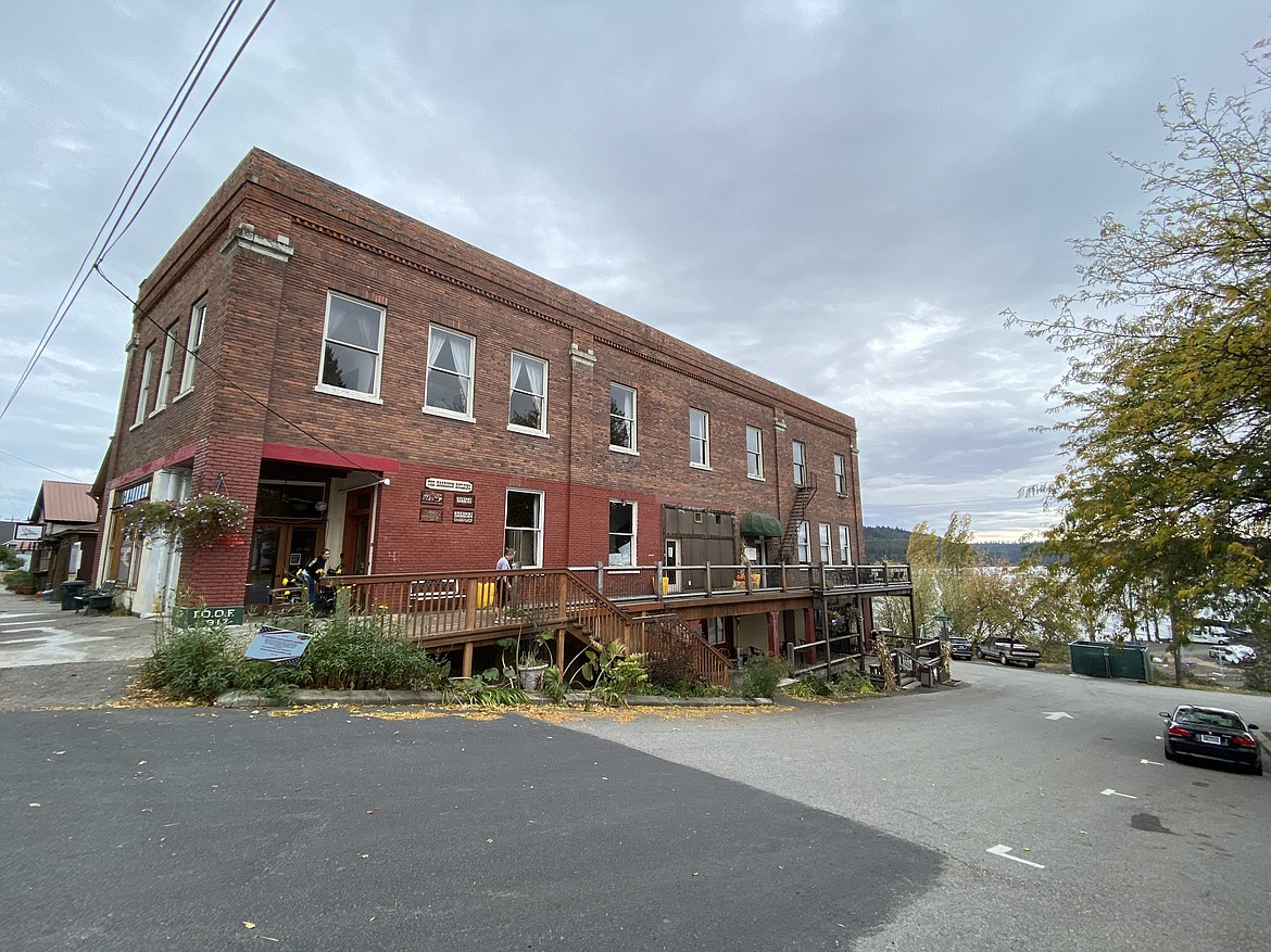 The Old Harrison Building is one of the few buildings that survived Harrison's 1917 fire that burned the majority of businesses and homes down. Now it is home to the Tin Cup breakfast and coffee shop, One Shot Charlie's bar and restaurant, and Simply Wilder Soap. (MADISON HARDY/Press)