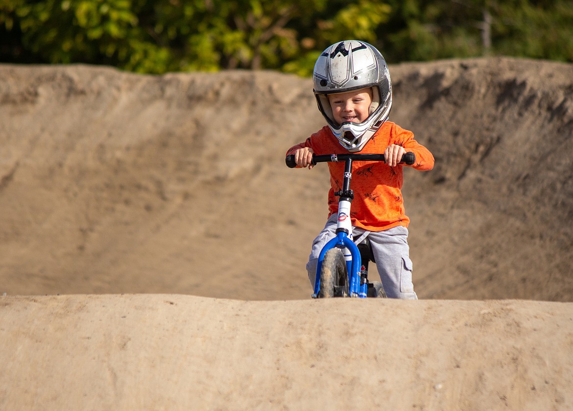 Young strider rider Parker Gerpheide helps kick off races at the BMX track in Moses Lake on Saturday afternoon at the final event of the season.