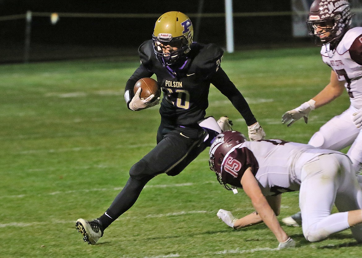 Xavier Fisher gains some yards after a catch against Butte Central. (Bob Gunderson)