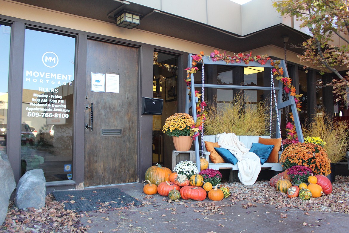 Movement Mortgage outdoor office decorations took the Moses Lake Chamber of Commerce People's Choice Award for seasonal decorating for businesses out of ten entries total. The display was set up by loan officer Barry Sterner and his wife, Rebecca Sterner. Barry Sterner built the swing out of a wooden pallet and many of the decorations came from Rebecca Sterner's own floral business, Rue & Sage. Pumpkins came from Jack's Pumpkin Patch in Ephrata. The Columbia Basin Herald's office display took second place.