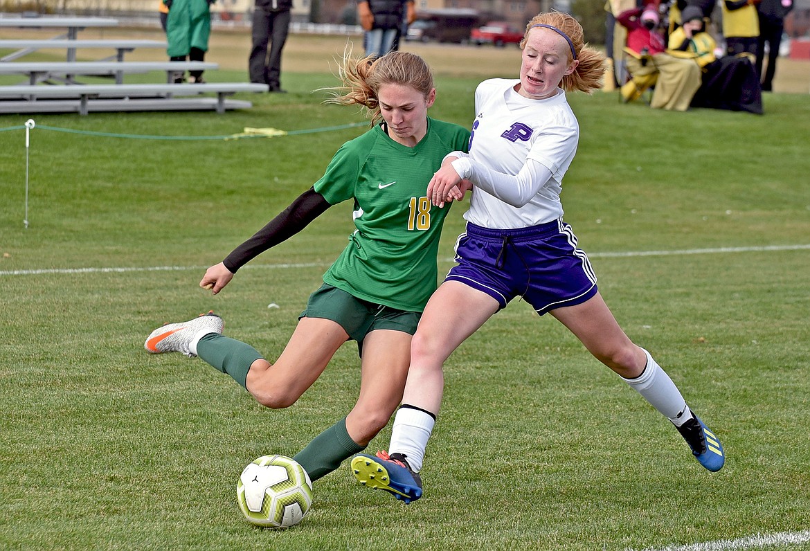 Whitefish freshman Maeve Ingelfinger takes on a Park High defender during a quarterfinal playoff game Saturday at Smith Fields. (Whitney England/Whitefish Pilot)