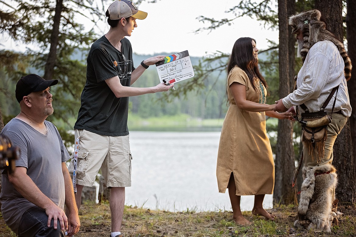 Brandon Smith, far left, directs a scene in "Nexus of Evil." The full-length horror film was shot over seven days at the Darrell Fenner 4H Camp on Loon Lake outside of Ferndale. (Second Wind Productions)