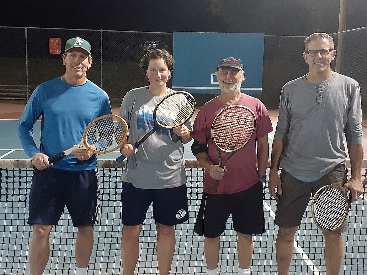 Jim Albrecht Memorial Wooden Racquet Classic John Beck and Julie Newhouse and Roger Doucet and Francis Danielek pose for a photo at the Boundary County Tennis Association's last tournament of the season.