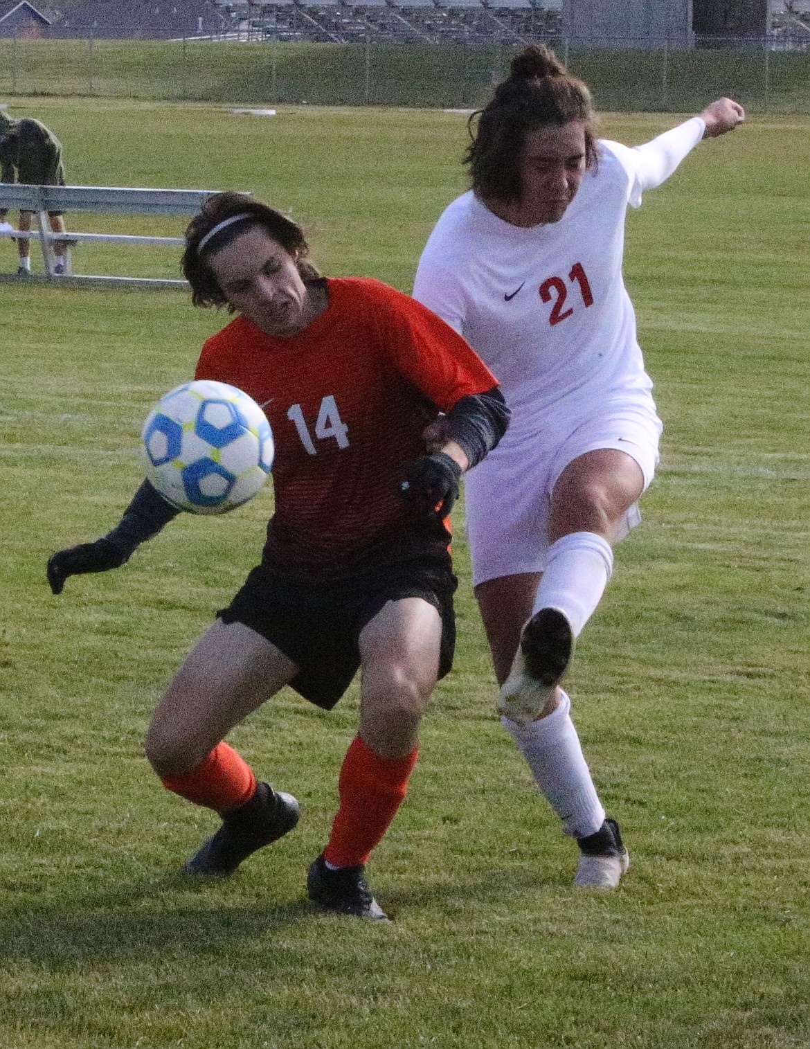 JASON ELLIOTT/Press
Logan Koller of Post Falls battles with Boise defender Zach Owen for possession of the ball during the second half of Thursday's match at Post Falls High.