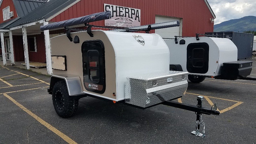 Sherpa trailers on the lot outside the company's manufacturing headquarters in Libby (courtesy photos).