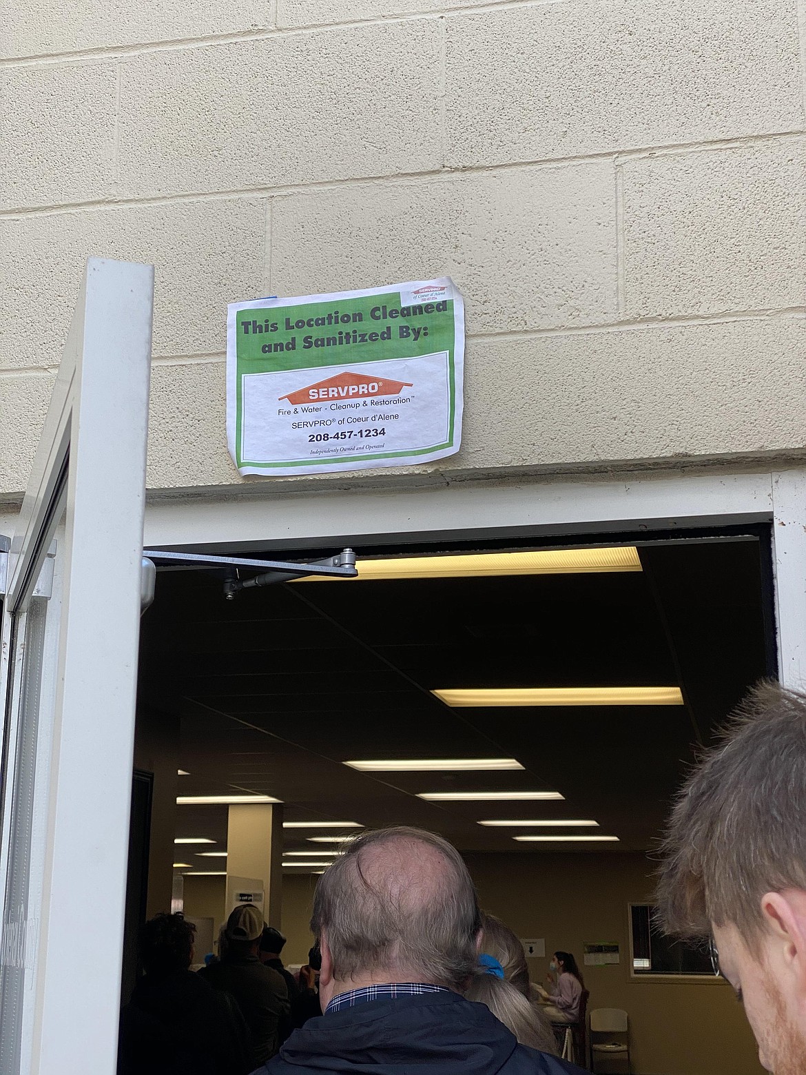 Signage around the Kootenai County Elections Office informs early voters of the COVID-19 safety guidelines and deep cleaning measures by Servpro. (MADISON HARDY/Press)