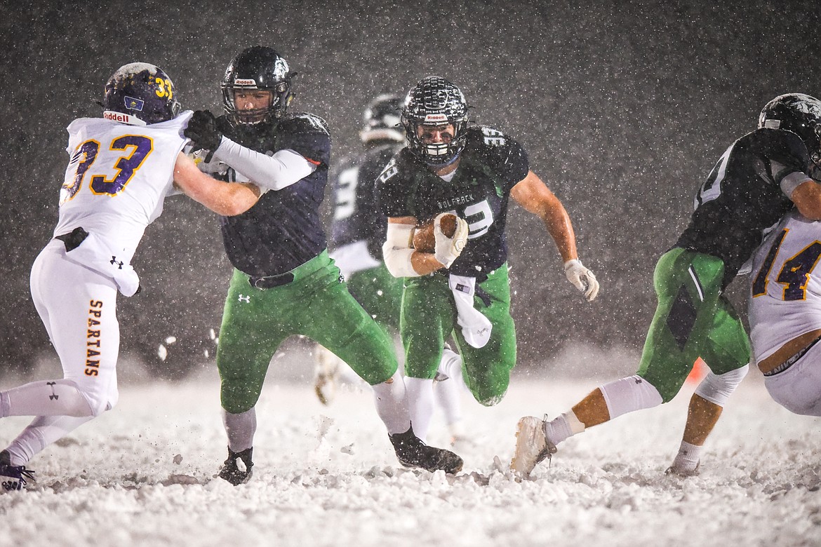 Glacier running back Jake Rendina (33) looks for running room against Missoula Sentinel in the second quarter at Legends Stadium on Friday. (Casey Kreider/Daily Inter Lake)