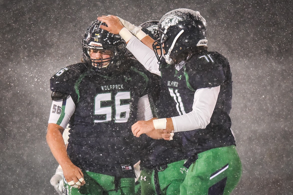 Glacier's Rocco Beccari (56) gets congratulated by teammates after sacking Missoula Sentinel quarterback Camden Sirmon (9) in the first quarter at Legends Stadium on Friday. (Casey Kreider/Daily Inter Lake)