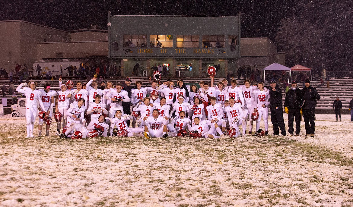 The Sandpoint football team poses for a photo after capturing the 4A Inland Empire League on Friday night.