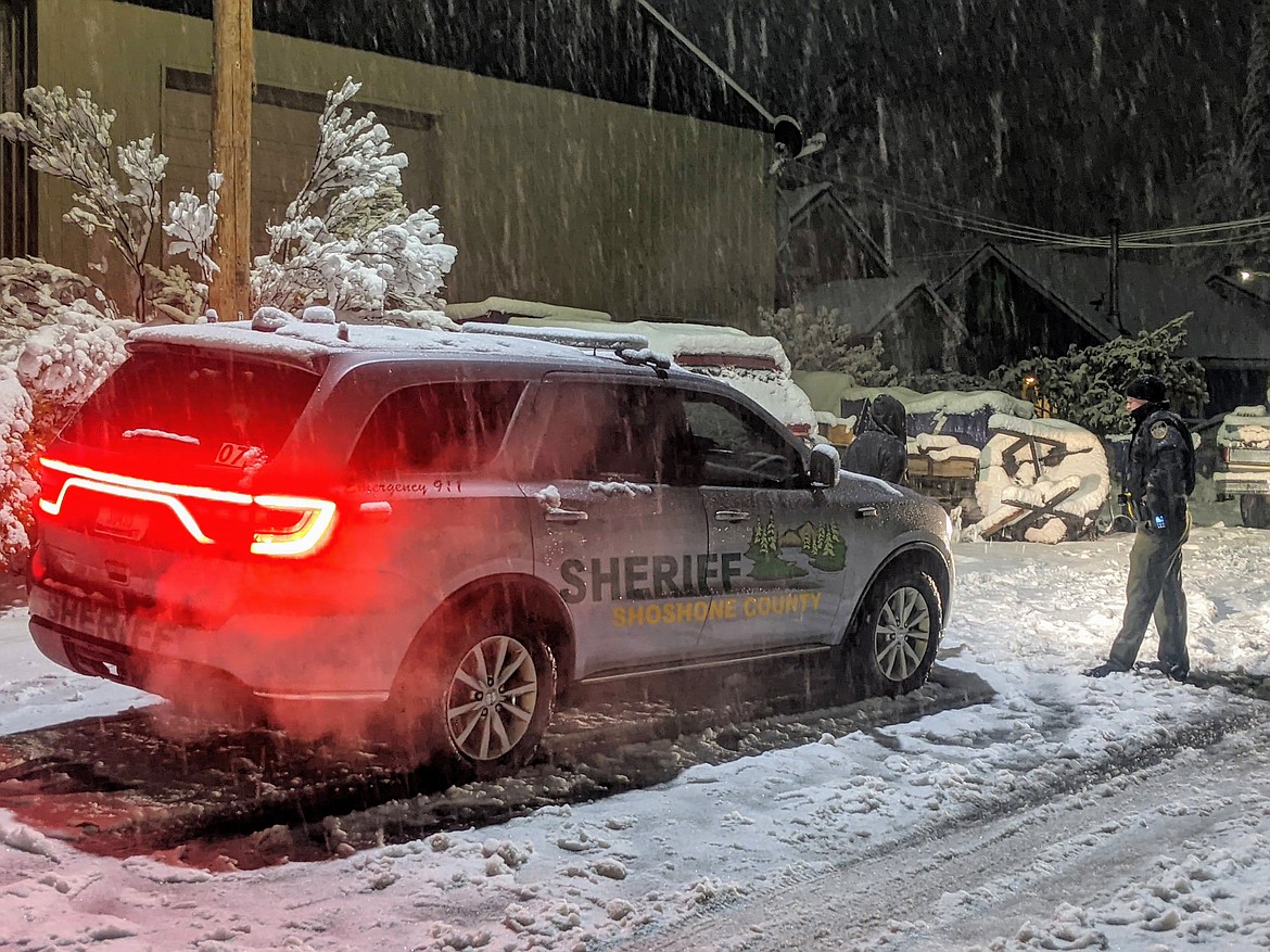 October: A Shoshone County Sheriff's Office deputy detains a suspect outside the residence at 115 F St. in Smelterville following a massive drug bust.