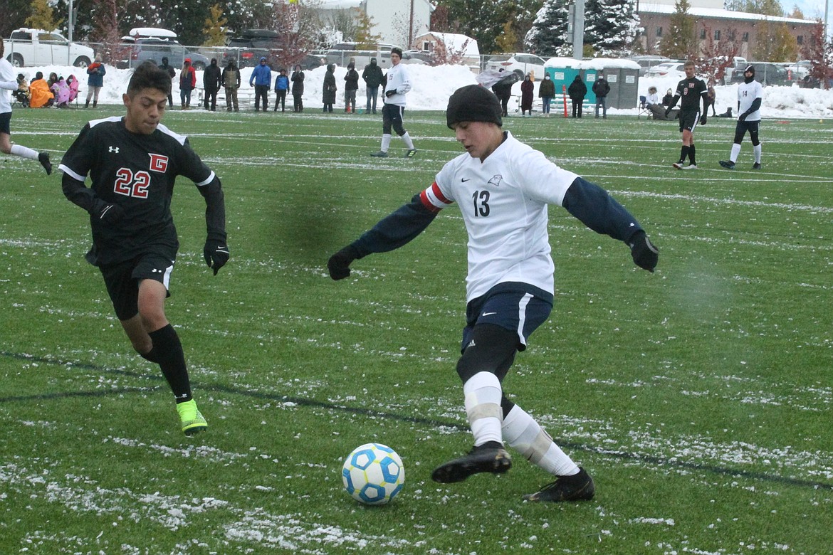 JASON ELLIOTT/Press
Coeur d'Alene Charter senior midfielder Quinn Clovis plays the ball up the field during Saturday's state 3A third-place match against Gooding at The Fields in Post Falls.