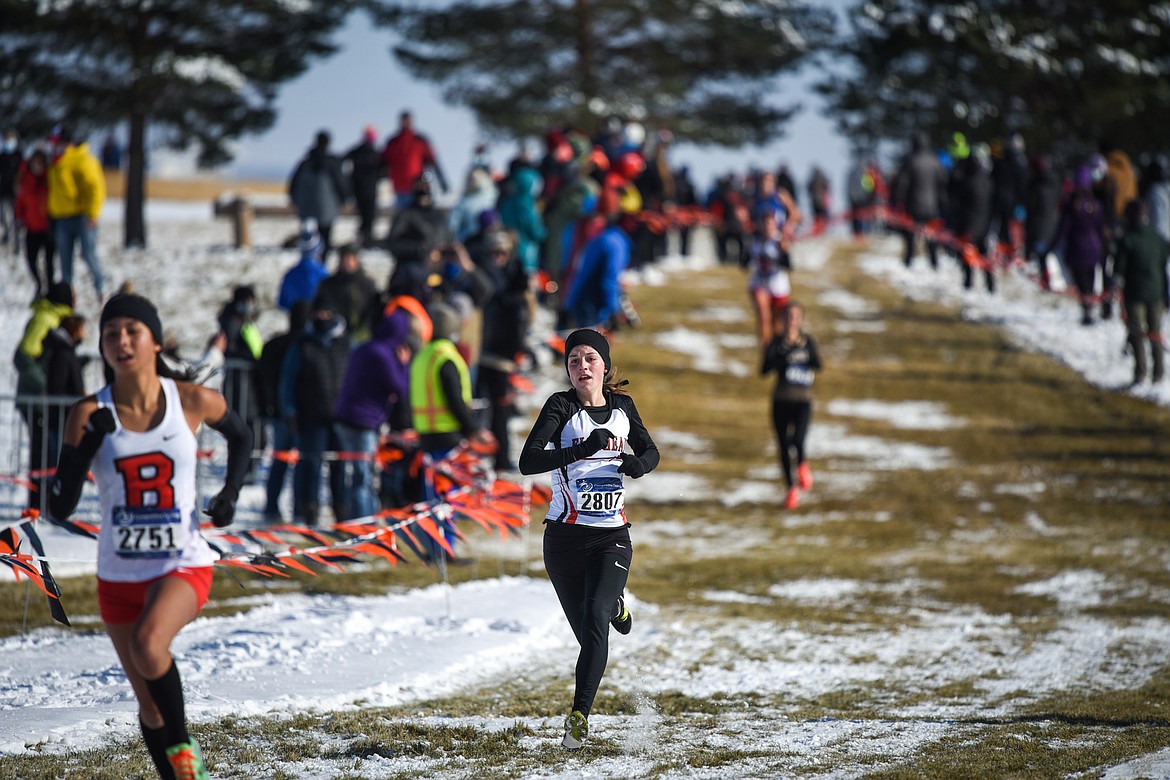 Flathead's Lilli Rumsey Eash approaches the finish line in the Class AA girls' state meet at Rebecca Farm on Saturday. Rumsey Eash placed seventh. (Casey Kreider/Daily Inter Lake)